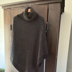 Calvin Klein black poncho with silver stitching
